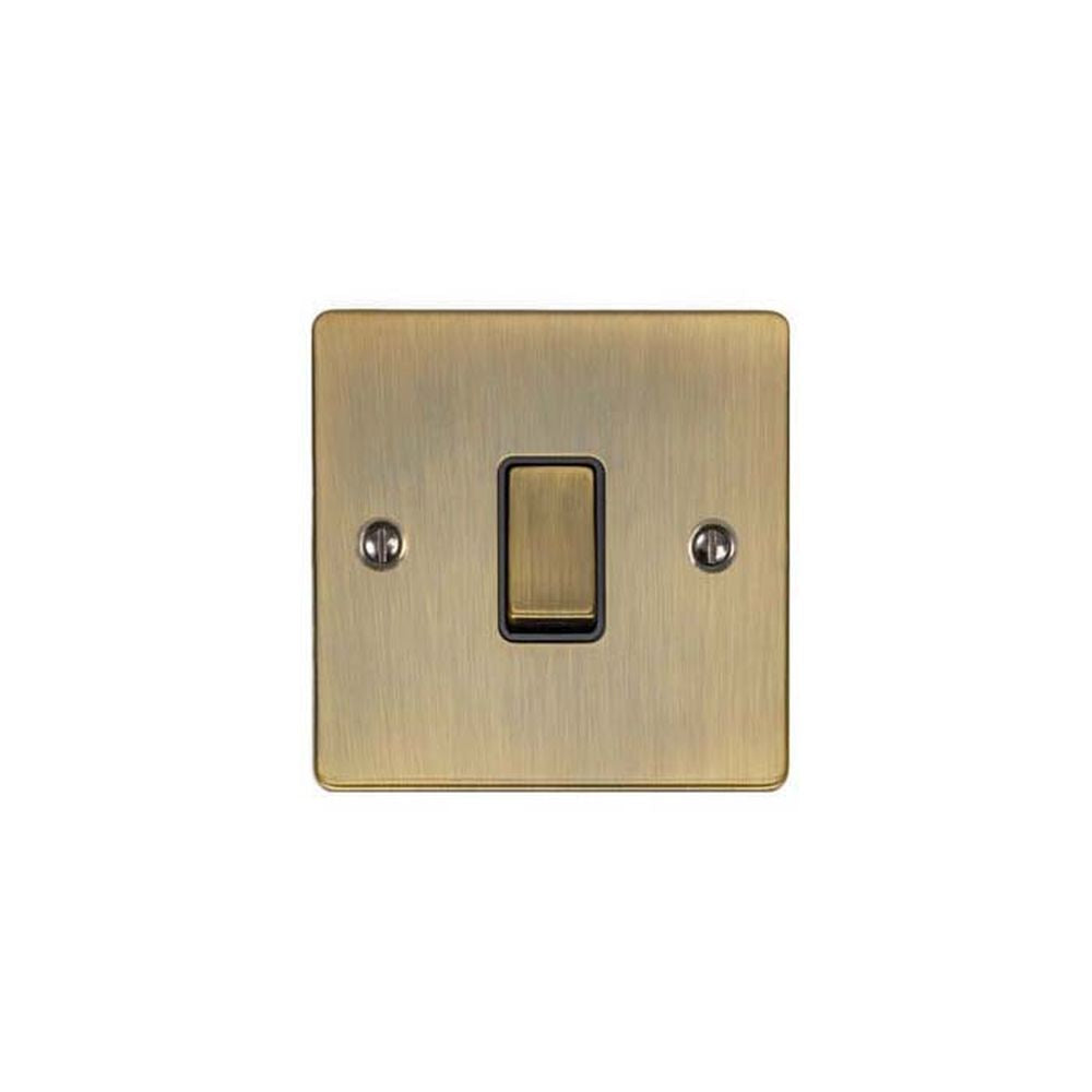 This is an image showing Eurolite Enhance Decorative 20Amp Switch - Antique Brass (With Black Trim) en20adpswabb available to order from trade door handles, quick delivery and discounted prices.