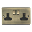 This is an image showing Eurolite Enhance Decorative 2 Gang Socket - Antique Brass (With Black Trim) en2soabb available to order from trade door handles, quick delivery and discounted prices.