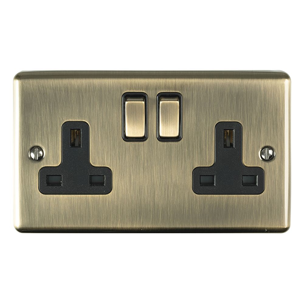 This is an image showing Eurolite Enhance Decorative 2 Gang Socket - Antique Brass (With Black Trim) en2soabb available to order from trade door handles, quick delivery and discounted prices.