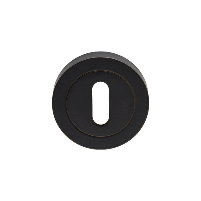 This is an image of a Carlisle Brass - Lock Escutcheon - Matt Black that is availble to order from Trade Door Handles in Kendal.