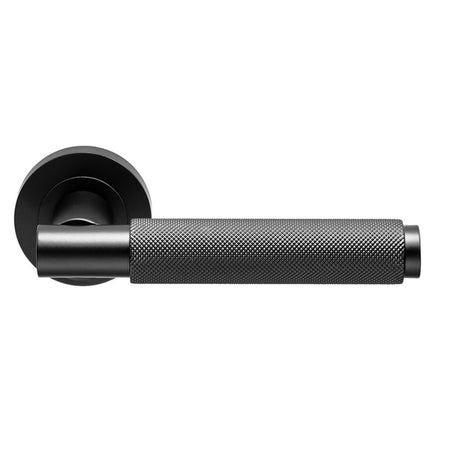 This is an image of a Carlisle Brass - Varese Knurled Lever on Rose - Matt Black that is availble to order from Trade Door Handles in Kendal.