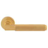 This is an image of a Carlisle Brass - Terazzo Lever On Round Rose - Satin Brass that is availble to order from Trade Door Handles in Kendal.