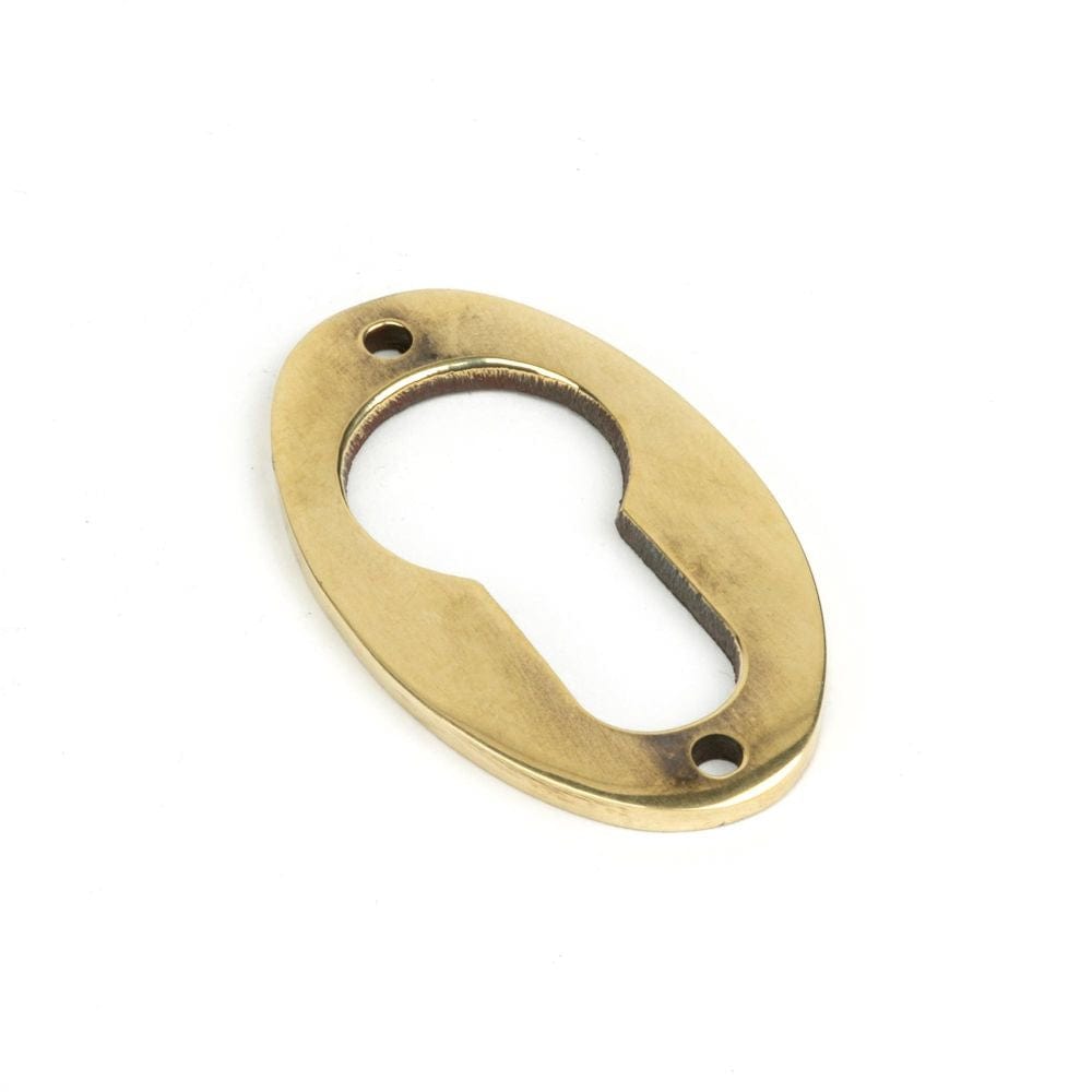 From The Anvil Door Furniture Aged Brass / Euro Profile Escutcheons From The Anvil - Aged Brass Oval Euro Escutcheon