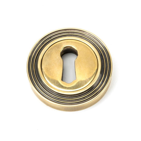 From The Anvil Door Furniture Aged Brass / Mortice Key Profile Escutcheons From The Anvil - Aged Brass Round Escutcheon (Beehive)