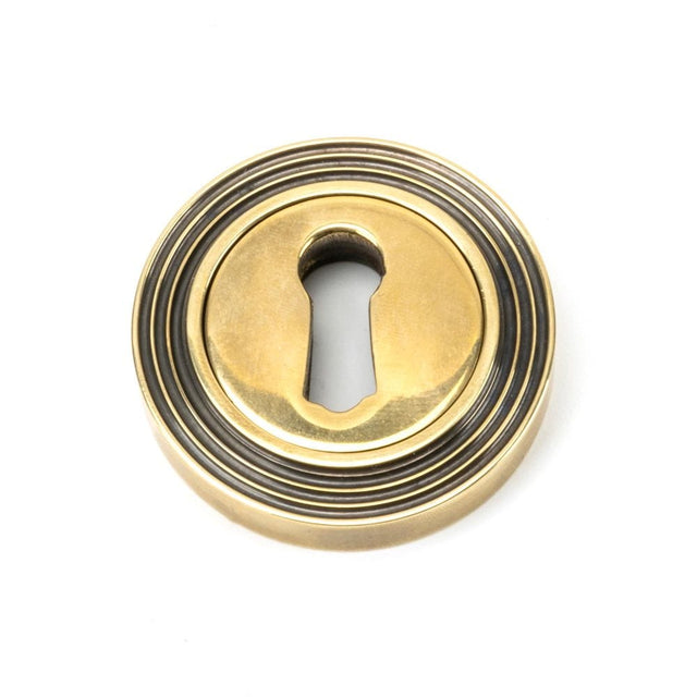 From The Anvil Door Furniture Aged Brass / Mortice Key Profile Escutcheons From The Anvil - Aged Brass Round Escutcheon (Beehive)