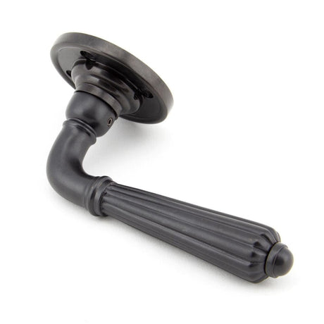 From The Anvil Door Furniture Aged Bronze / Round Rose From The Anvil - Aged Bronze Hinton Lever on Rose Set - Unsprung