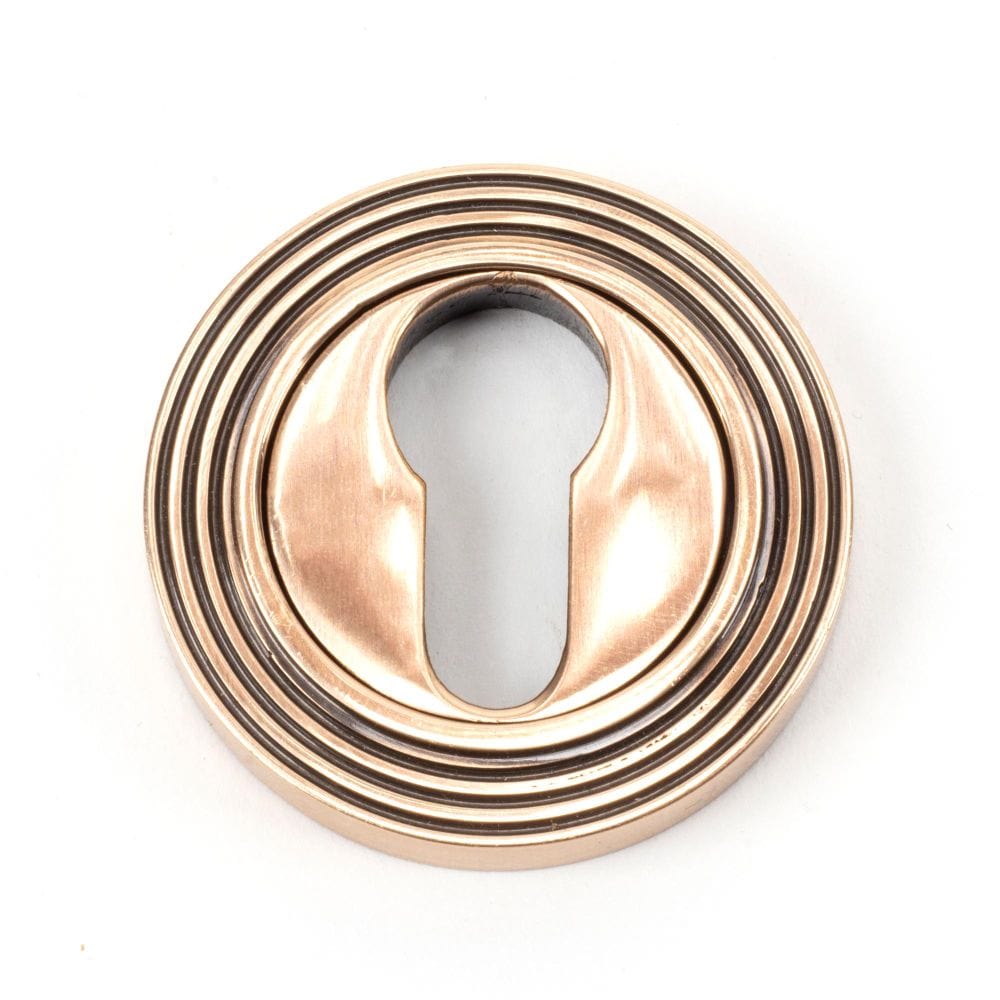 From The Anvil Door Furniture Polished Bronze / Euro Profile Escutcheons From The Anvil - Polished Bronze Round Euro Escutcheon (Beehive)