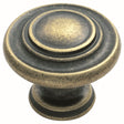 This is an image of a FTD - Traditional Pattern Knob 34mm - Antique Brass that is availble to order from Trade Door Handles in Kendal.