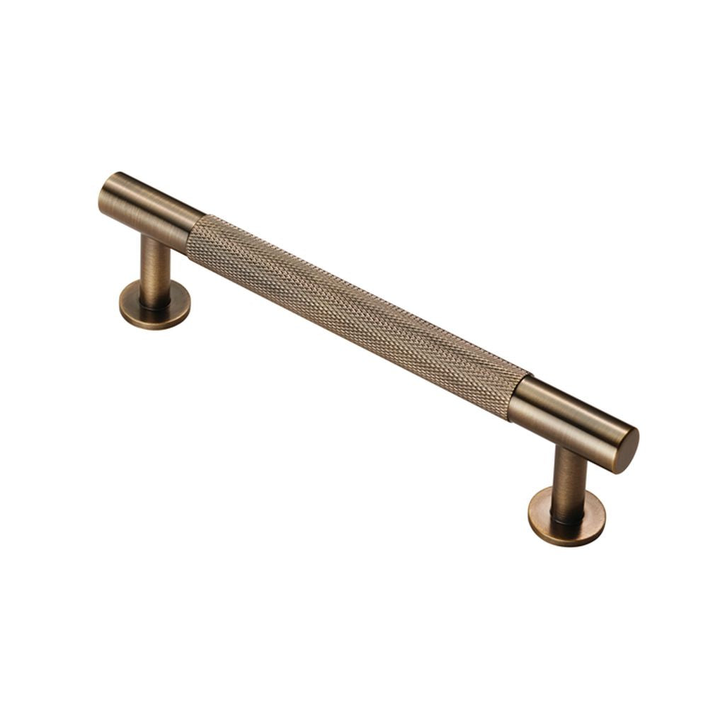 This is an image of a FTD - Knurled Pull Handle 128mm c/c - Antique Brass that is availble to order from Trade Door Handles in Kendal.