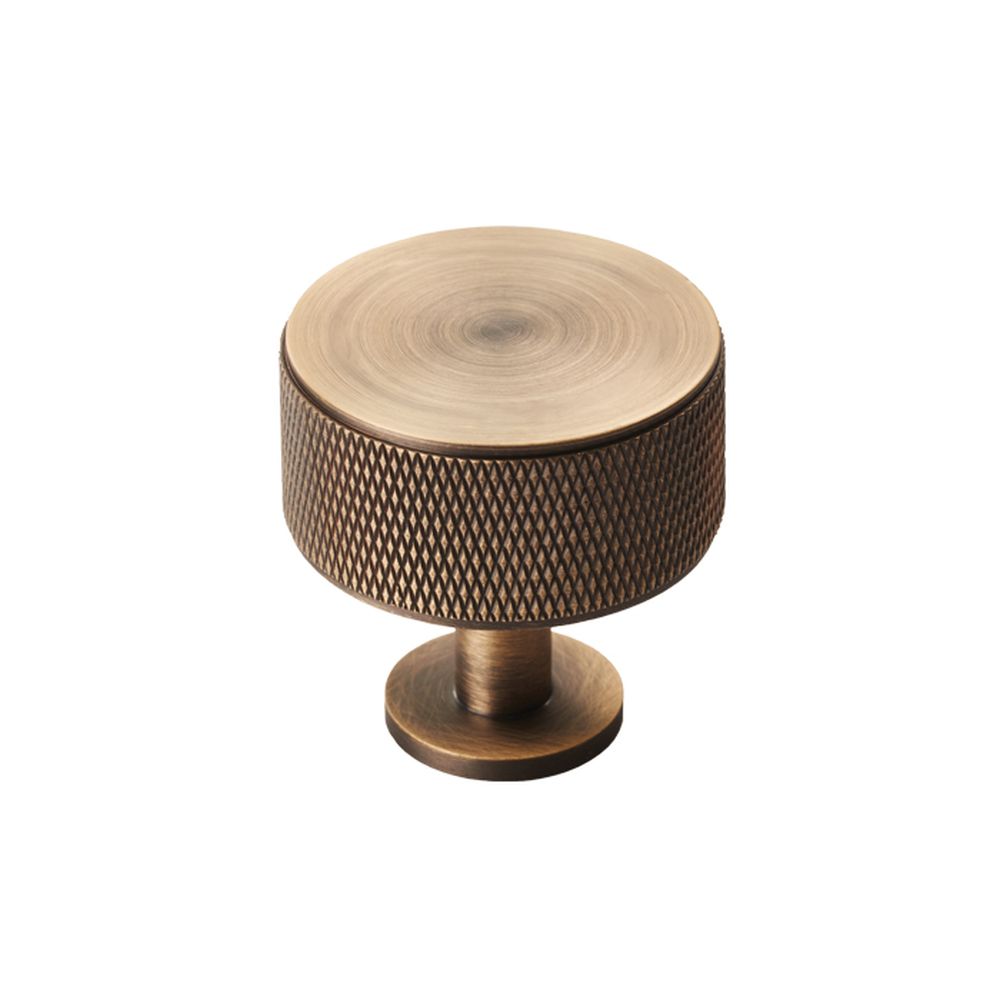 This is an image of a Carlisle Brass - Knurled Radio Knob - Antique Brass that is availble to order from Trade Door Handles in Kendal.