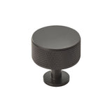 This is an image of a Carlisle Brass - Knurled Radio Knob - Matt Black that is availble to order from Trade Door Handles in Kendal.