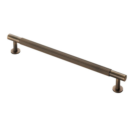 This is an image of a Carlisle Brass - Lines Pull Handle 224mm c/c - Antique Brass that is availble to order from Trade Door Handles in Kendal.