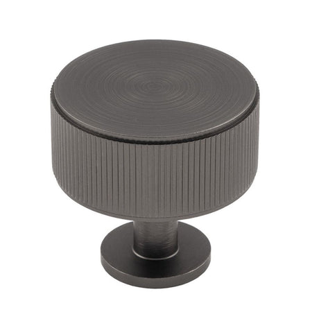 This is an image of a Carlisle Brass - Lines Radio Knob Anthracite that is availble to order from Trade Door Handles in Kendal.