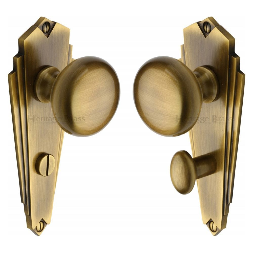 Heritage Brass Door Furniture Antique Brass / Bathroom Lock Mortice Knobs Heritage Brass - Mortice Knob on Bathroom Plate Broadway Design Antique Brass Finis