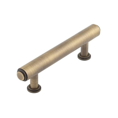 This is an image of a Burlington - Belgrave Cabinet Handle 96mm CTC - Antique Brass  that is availble to order from Trade Door Handles in Kendal.