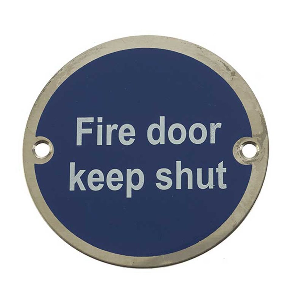 This is an image of a Frelan - Fire Door Keep Shut' - Signage 75mm Dia. - Polished Stainless Steel  that is availble to order from Trade Door Handles in Kendal.