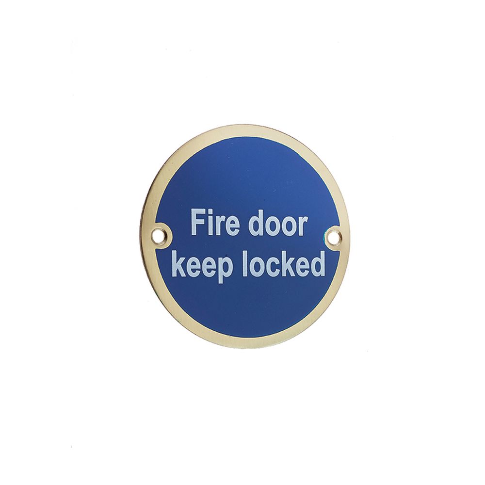 This is an image of a Frelan - Fire Door Keep Locked' - Signage 75mm Dia. - Polished Brass that is availble to order from Trade Door Handles in Kendal.