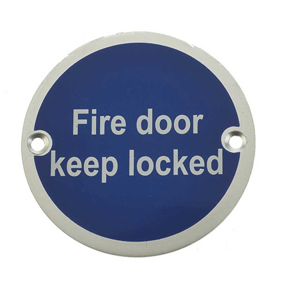 This is an image of a Frelan - Fire Door Keep Locked' - Signage 75mm Dia. - Satin Anodised Aluminium  that is availble to order from Trade Door Handles in Kendal.