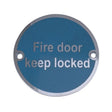 This is an image of a Frelan - Fire Door Keep Locked' - Signage 75mm Dia. - Satin Stainless Steel that is availble to order from Trade Door Handles in Kendal.