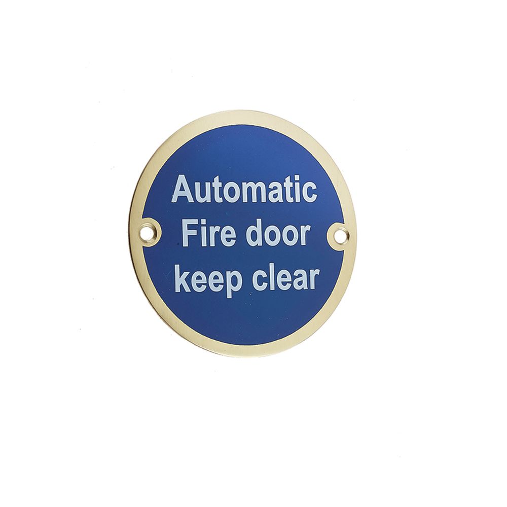 This is an image of a Frelan - Automatic Fire Door Keep Clear - Signage 75mm Dia. - Polished Brass  that is availble to order from Trade Door Handles in Kendal.