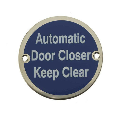 This is an image of a Frelan - Automatic Door Closer Keep Clear - Signage 75mm Dia. - Polished Stainle that is availble to order from Trade Door Handles in Kendal.