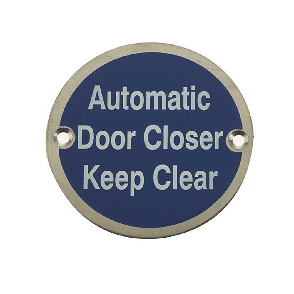 This is an image of a Frelan - Automatic Door Closer Keep Clear - Signage 75mm Dia. - Satin Stainless  that is availble to order from Trade Door Handles in Kendal.