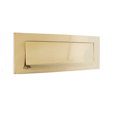 This is an image of a Frelan - Gravity Letter Plate 254x76mm - Polished Brass that is availble to order from Trade Door Handles in Kendal.