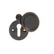 This is an image of a Frelan - Round Covered Escutcheon Standard Keyway - Antique Brass  that is availble to order from Trade Door Handles in Kendal.