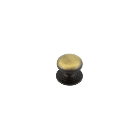 This is an image of a Frelan - 32mm AB Cupboard knob   that is availble to order from Trade Door Handles in Kendal.