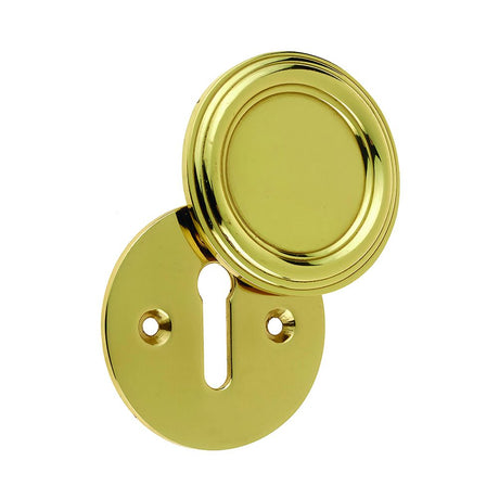 This is an image of a Frelan - PB Covered escutcheon   that is availble to order from Trade Door Handles in Kendal.