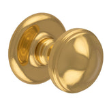 This is an image of a Carlisle Brass - Round Centre Door Knob - Polished Brass that is availble to order from Trade Door Handles in Kendal.