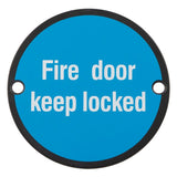 This is an image of a Carlisle Brass - Signage Fire Door - Keep Locked - Matt Black that is availble to order from Trade Door Handles in Kendal.