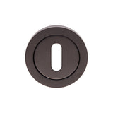 This is an image of a Eurospec - Steelworx SWL Escutcheon - Matt Black that is availble to order from Trade Door Handles in Kendal.