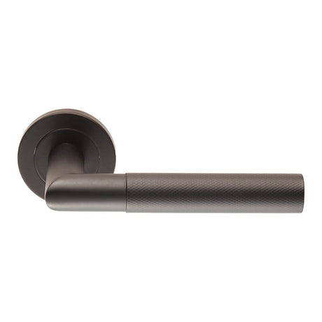 This is an image of a Eurospec - Steelworx Crown Knurled Lever - Matt Black that is availble to order from Trade Door Handles in Kendal.