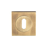 This is an image of a Serozzetta - Square Standard Lock Escutcheon Antique Brass - Antique Brass that is availble to order from Trade Door Handles in Kendal.